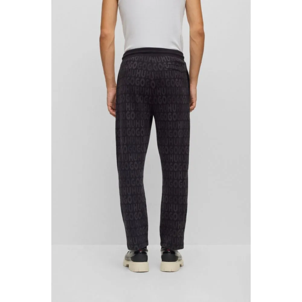 Cotton tracksuit bottoms with drawstring waist and monogram jacquard