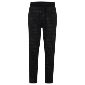 Cotton tracksuit bottoms with drawstring waist and monogram jacquard