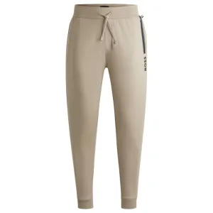 Drawcord tracksuit bottoms in cotton terry with logo print