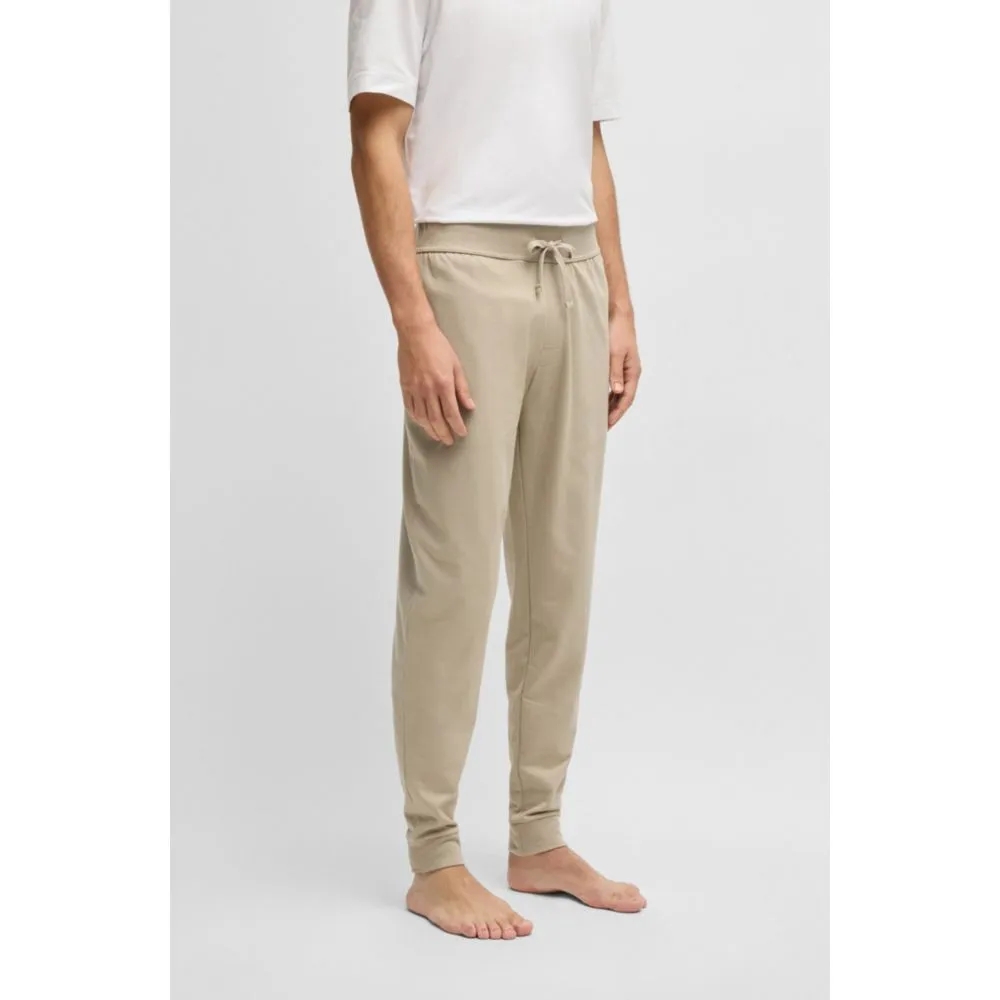 Drawcord tracksuit bottoms in cotton terry with logo print