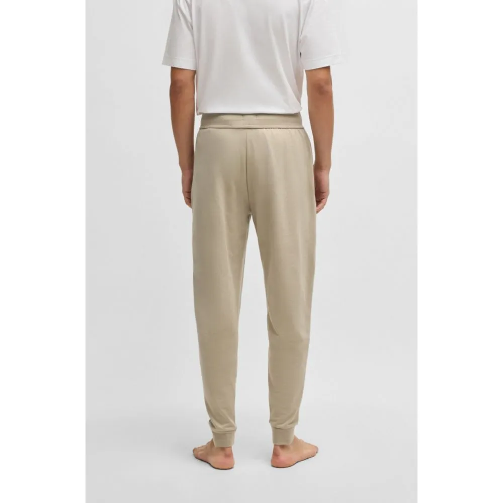 Drawcord tracksuit bottoms in cotton terry with logo print