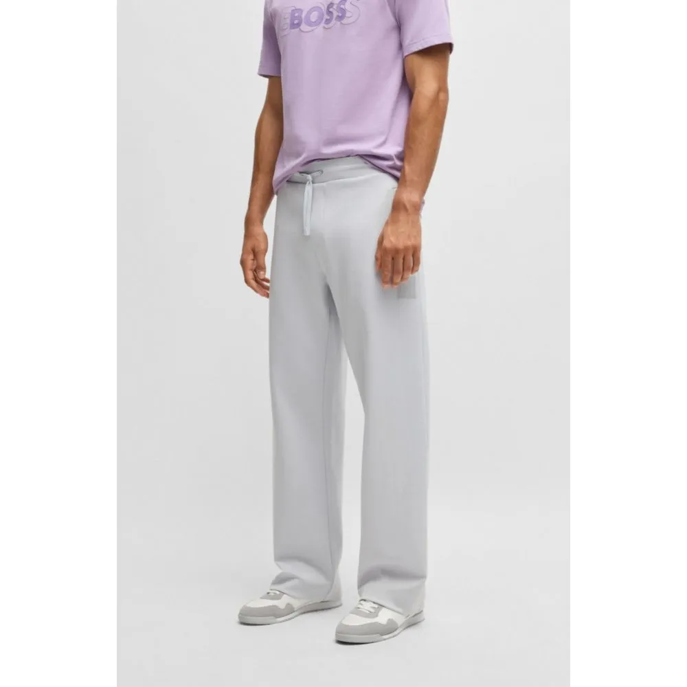 Tracksuit bottoms in a drop-needle cotton