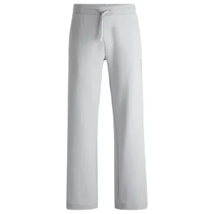 Tracksuit bottoms in a drop-needle cotton