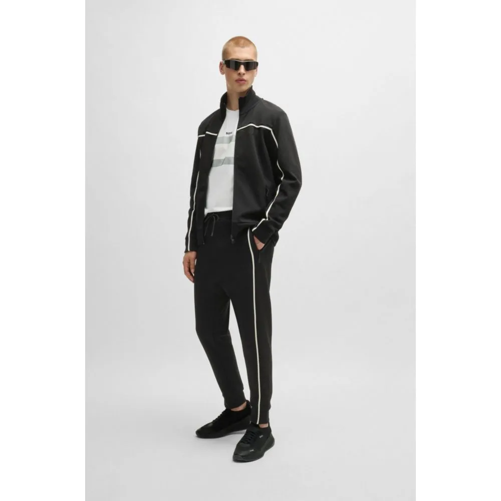 Tracksuit bottoms with tape inserts